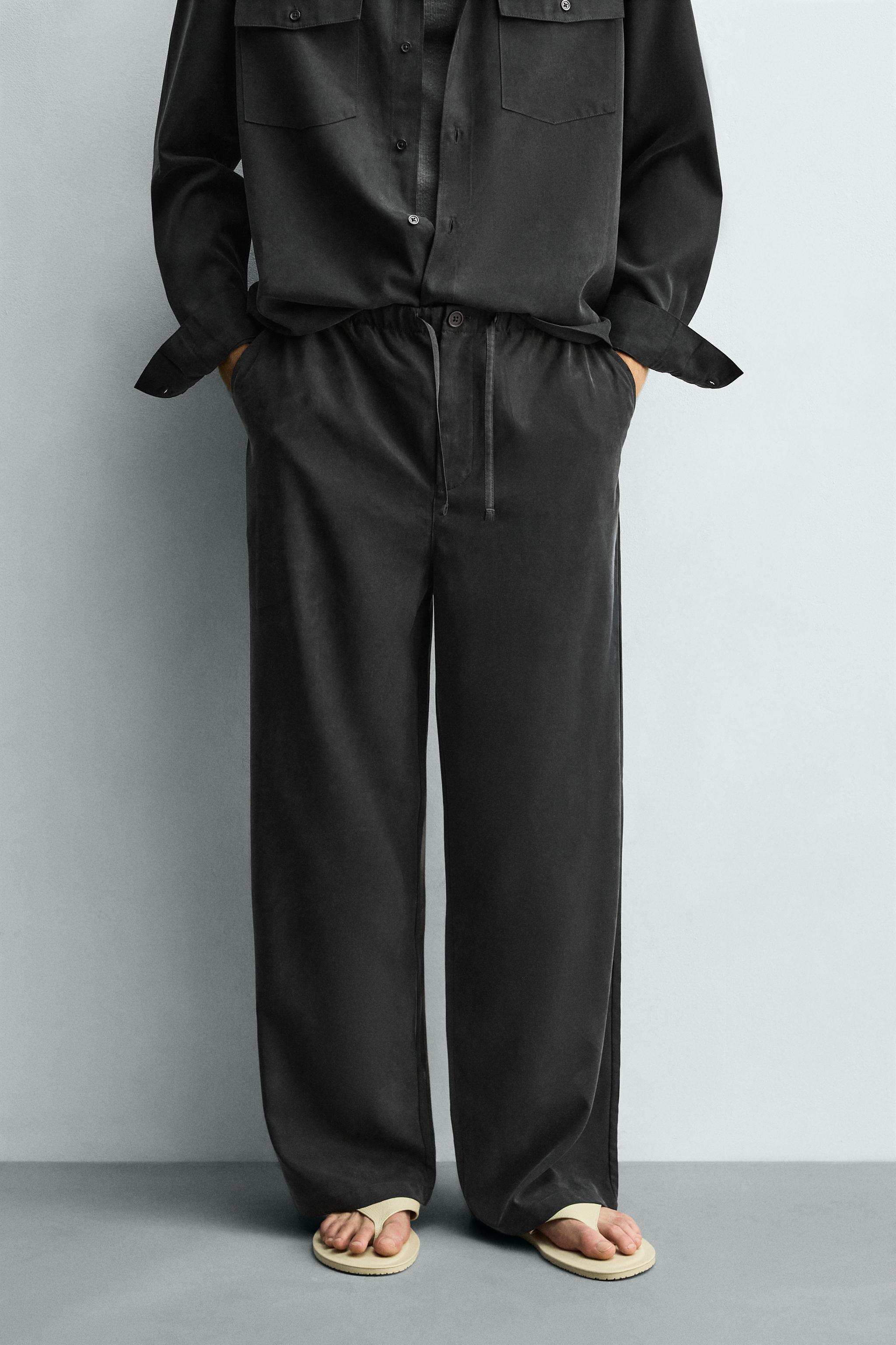 RELAXED FIT FLOWY PANTS